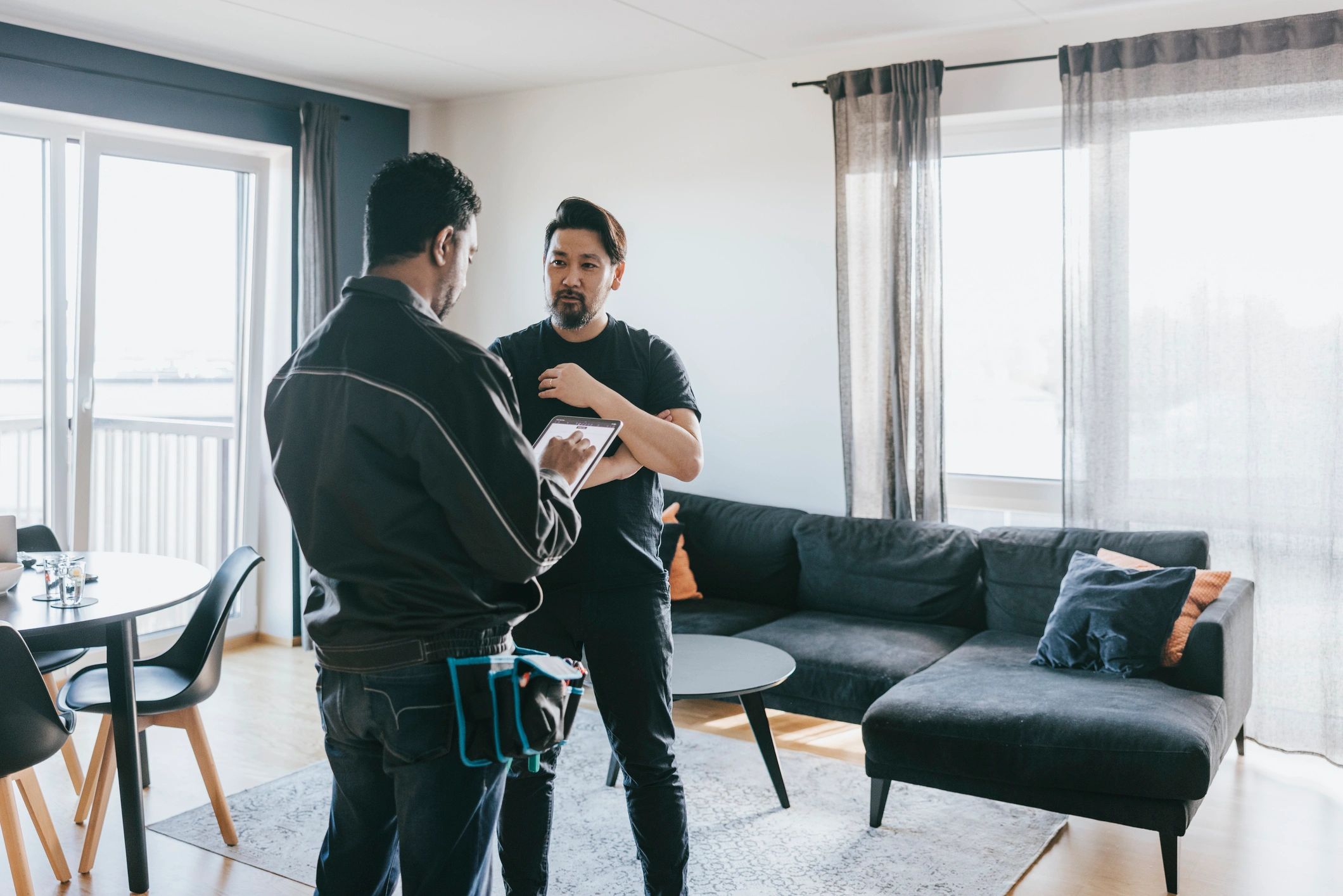 Technician speaking with a customer about pest control service
