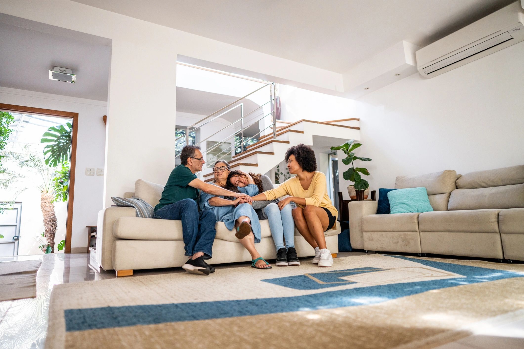 Family relaxing together in a clean living room
